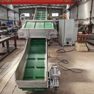 Self-unloading belt iron remover